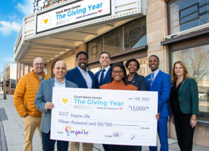 Count Basie Center and Bank of America officials present a $15,000 check to Inspire Life